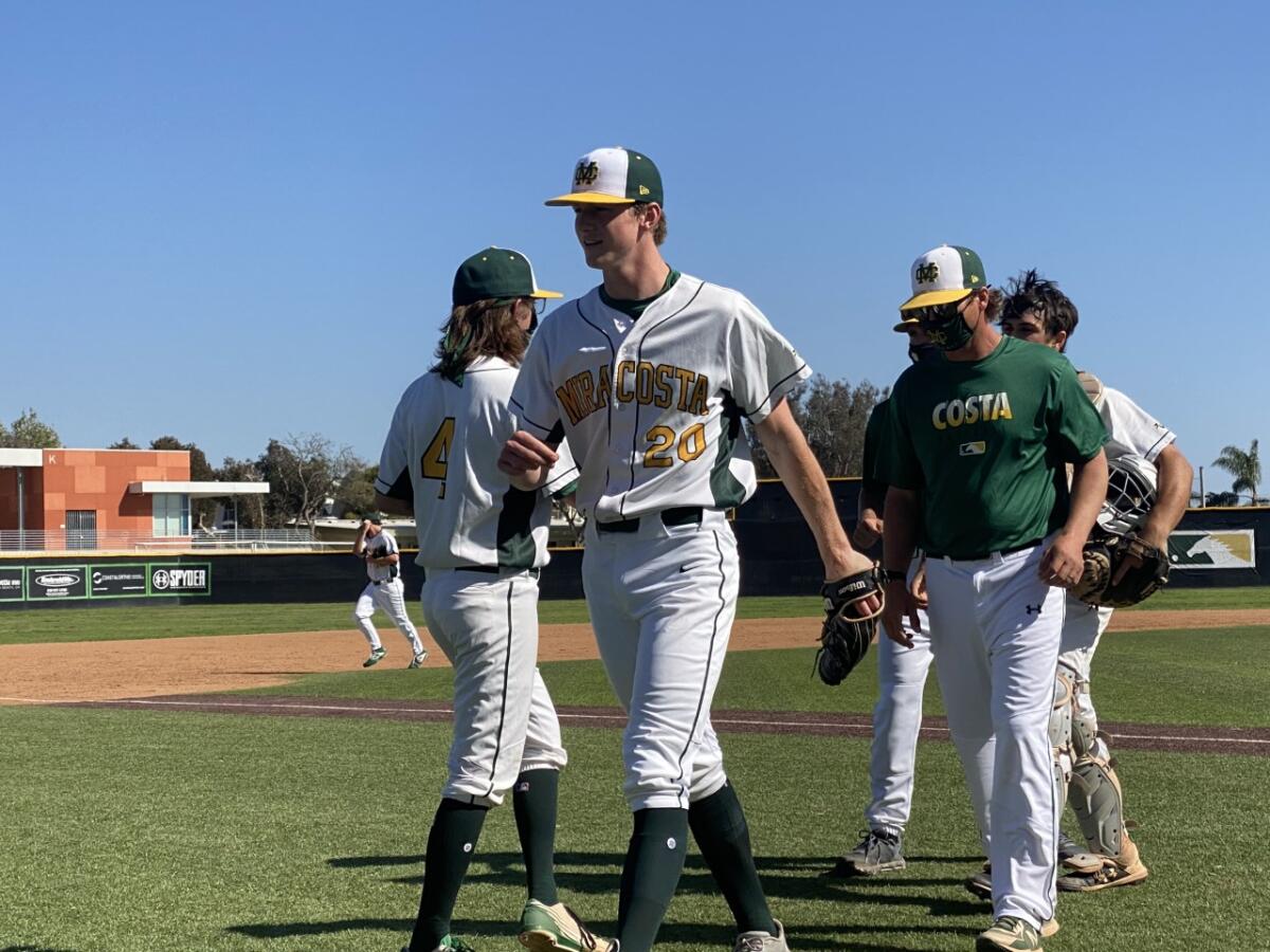 Mira Costa pitcher Thatcher Hurd walks off the mound after pitching in front of more than a dozen pro scouts.