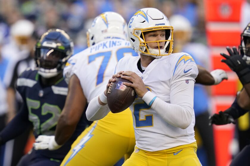 Los Angeles Chargers quarterback Easton Stick (2) passes against the Seattle Seahawks.