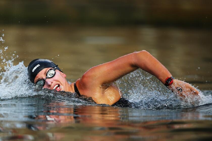 Haley Anderson competes in the 5-kilometer open water swim Saturday at the swimming world championships in Barcelona, Spain.