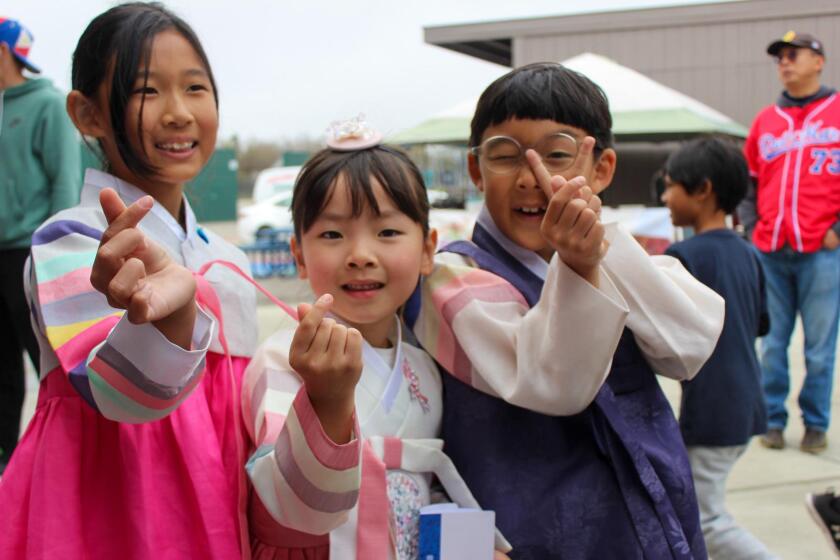 Students wear hanboks, a traditional clothing of the Korean people.