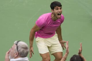Carlos Alcaraz, of Spain, celebrates after defeating Daniil Medvedev, of Russia, during the men's singles final.