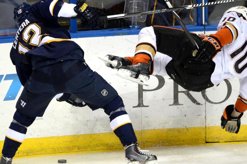 Ducks winger Corey Perry (10) is sent flying after Blues center Jori Lehtera, who was called for tripping on the play in the second period Thursday night.