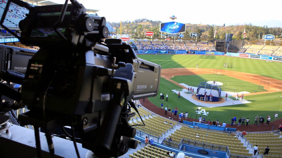 A camera in the press box at Dodger Stadium on July 29, 2014 .