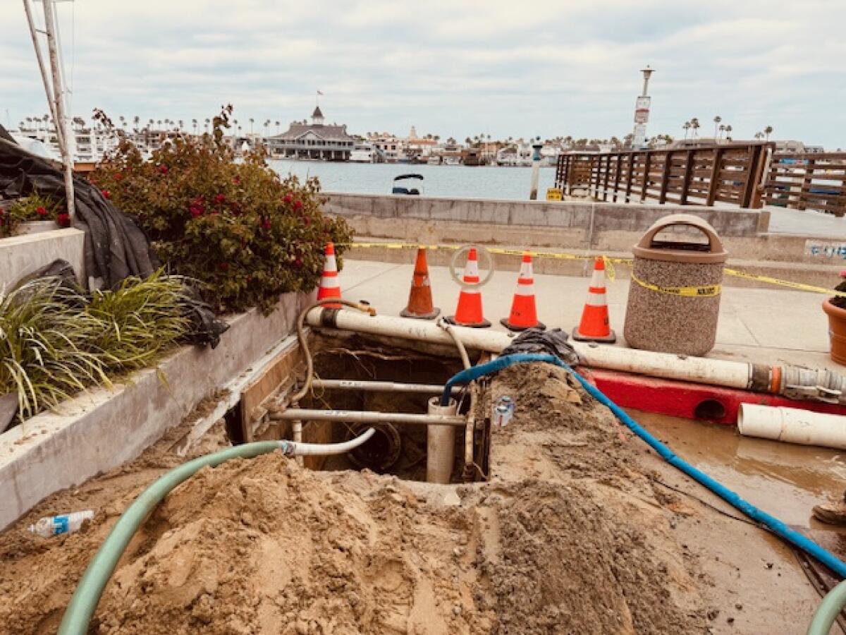 One of the excavation pits that was dug to address the underwater pipe leak on Opal Street on Balboa Island.