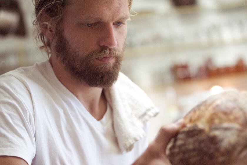 Chef Travis Lett bakes bread at his take-out restaurant next door to Gjelina in Venice.