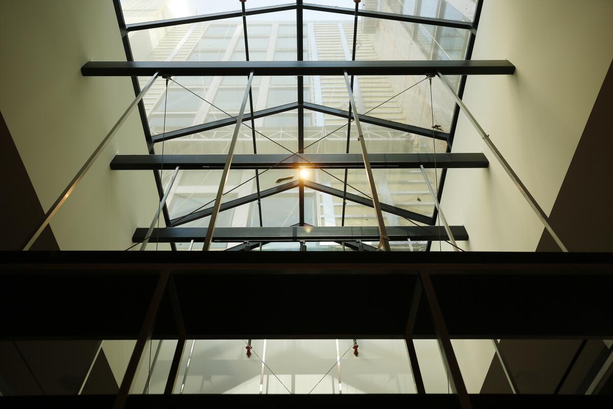 A massive skylight brings light to the main gathering area of the lobby of the CitizenM hotel 