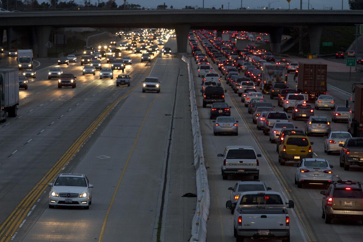 A lawmaker says the gas tax doesn't cover the cost of highway upkeep. The 405 Freeway in Costa Mesa.