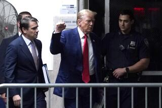 Former President Donald Trump raises his fist as he walks to the courtroom after a break in his trial at Manhattan criminal court in New York, on Friday, Friday, May 10, 2024. (Timothy A. Clary/Pool Photo via AP)