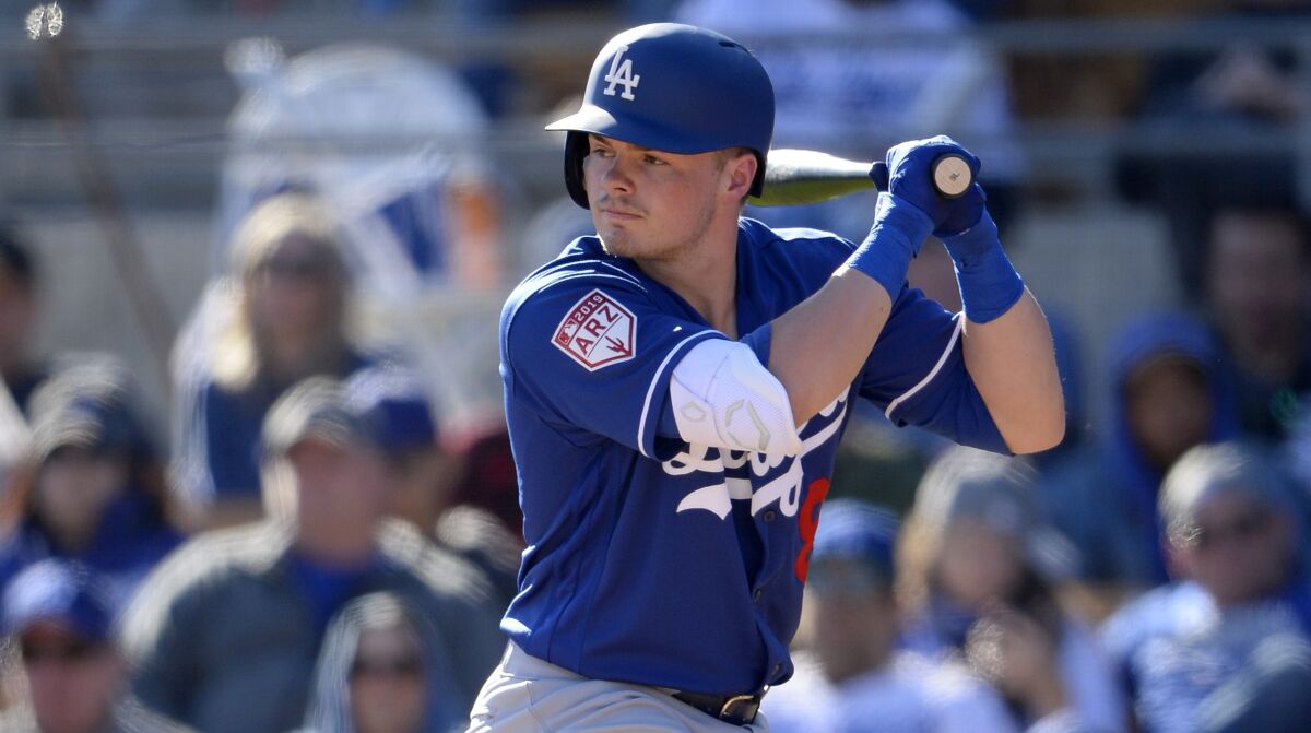 Dodgers shortstop Gavin Lux bats against the Chicago White Sox during an exhibition game on Feb. 23.