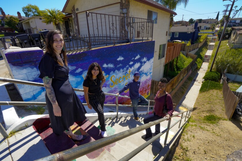 Shirish Villasenor, Isabel Garcia, Herbert Delong and Shannon White stand at the Secret Stairs of Valencia Park