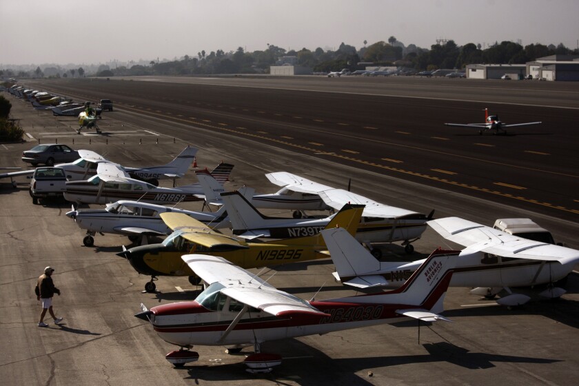 Aircraft line the tarmac at embattled Santa Monica Airport, which is once again the target of lawsuits to determine its future.