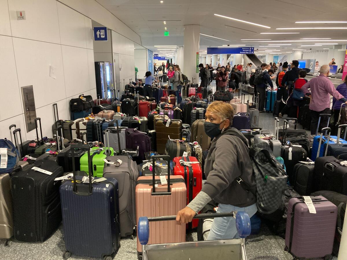 The scene Monday at the Southwest Airlines baggage terminal at Los Angeles International Airport.