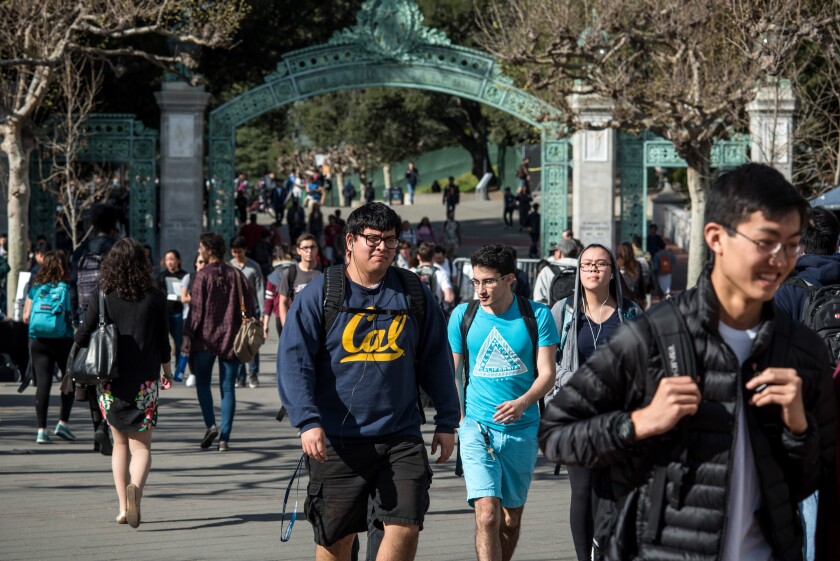 Students play and study around the campus of the University of California at Berkeley in 2017.