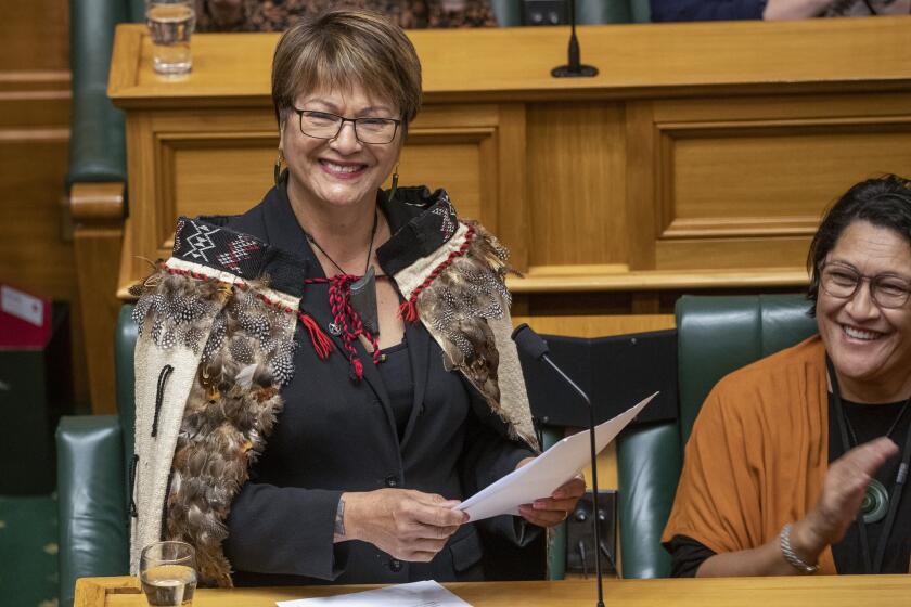 New Labour MP Soraya Peke-Mason smiles during her maiden speech at Parliament in Wellington, New Zealand, Tuesday, Oct. 25, 2022. For the first time in New Zealand's history, a majority of lawmakers are women. (Mark Mitchell/New Zealand Herald via AP)