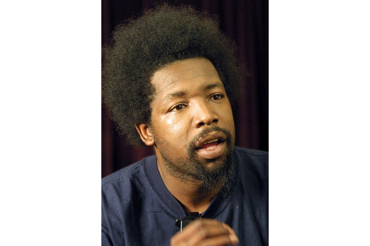 FILE - Afroman, whose real name is Joseph Foreman, poses for a portrait in New York, Aug. 22, 2001. On Monday, March 13, 2023, seven law enforcement officers filed suit against Afroman, accusing the rap artist of improperly using footage from a police raid on his Ohio home last year in his music videos. (AP Photo/Shawn Baldwin, File)