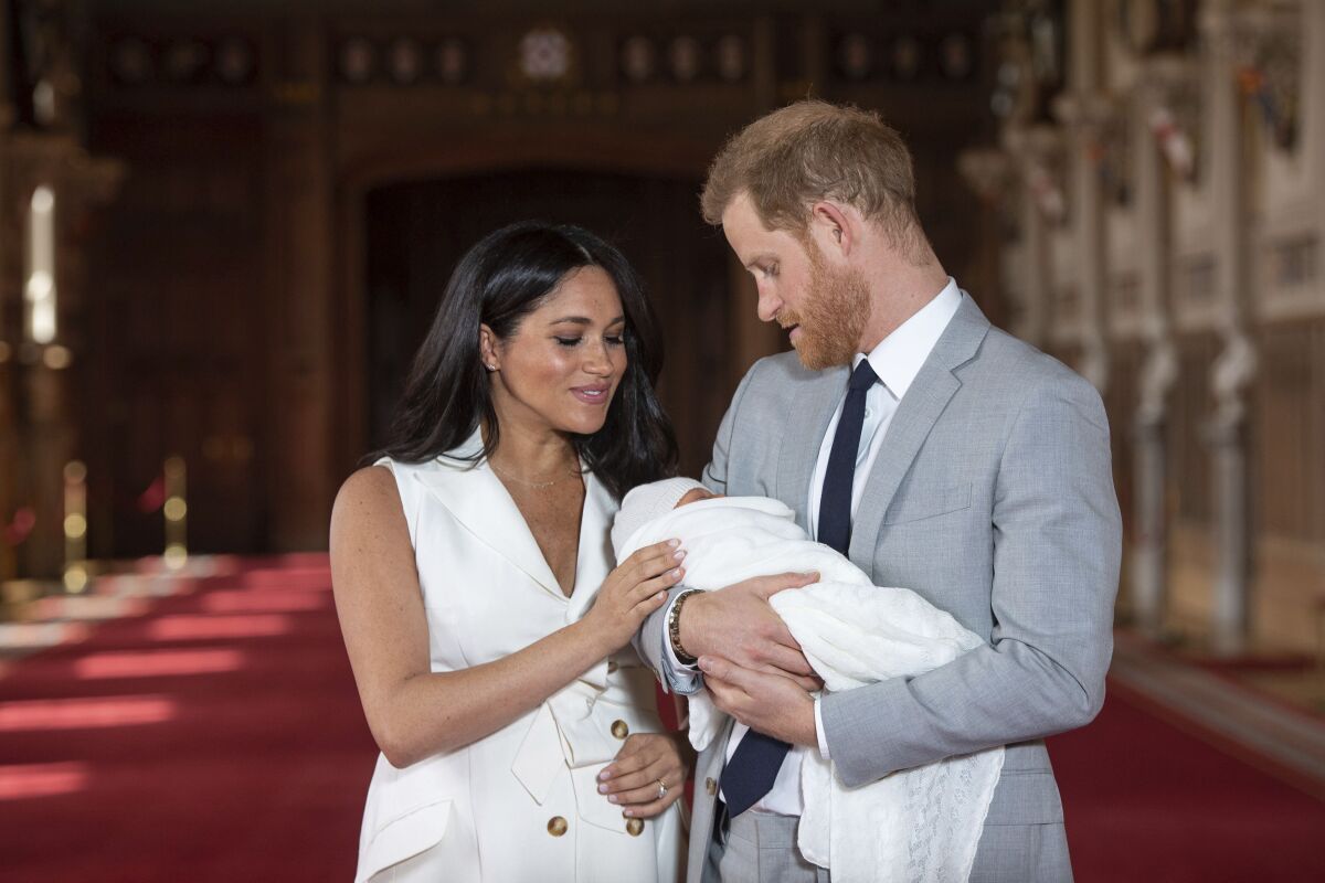 Britain's Prince Harry and Meghan with their newborn son Archie