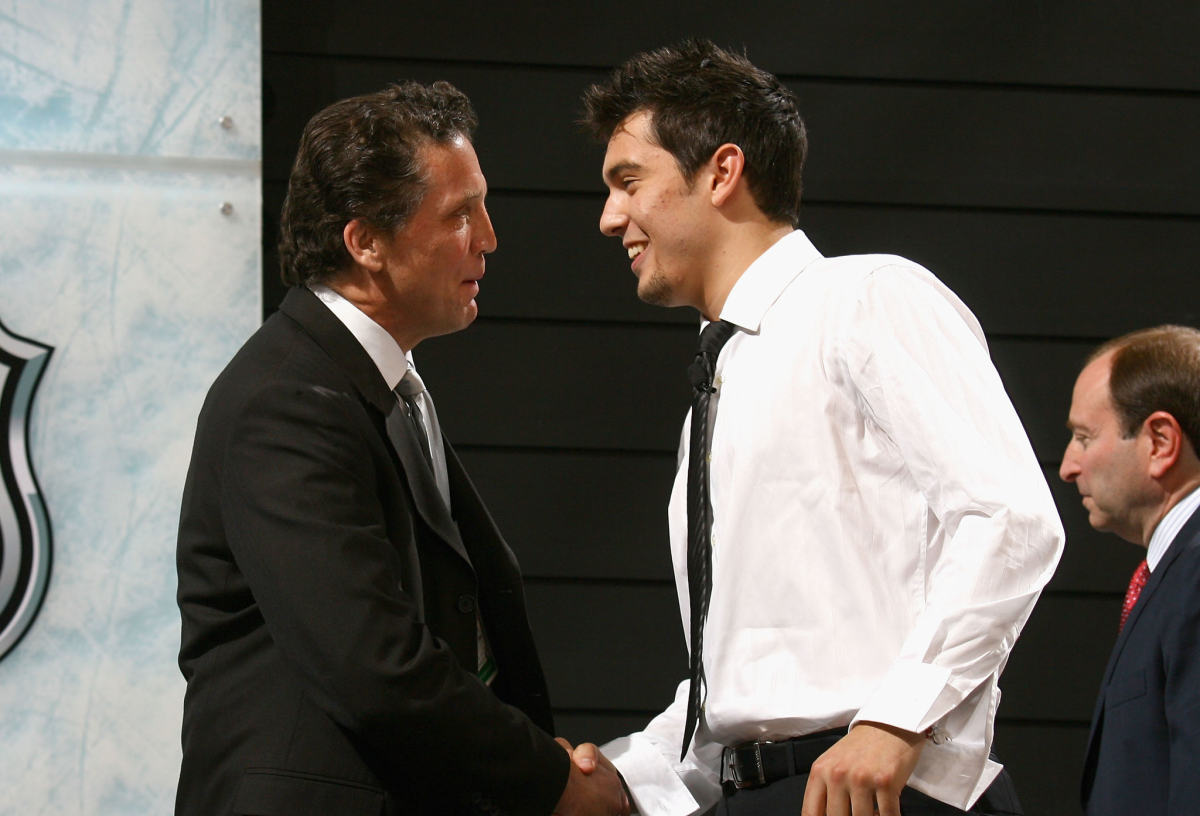 Drew Doughty shakes hands with Kings general manager Dean Lombardi at the 2008 NHL draft.