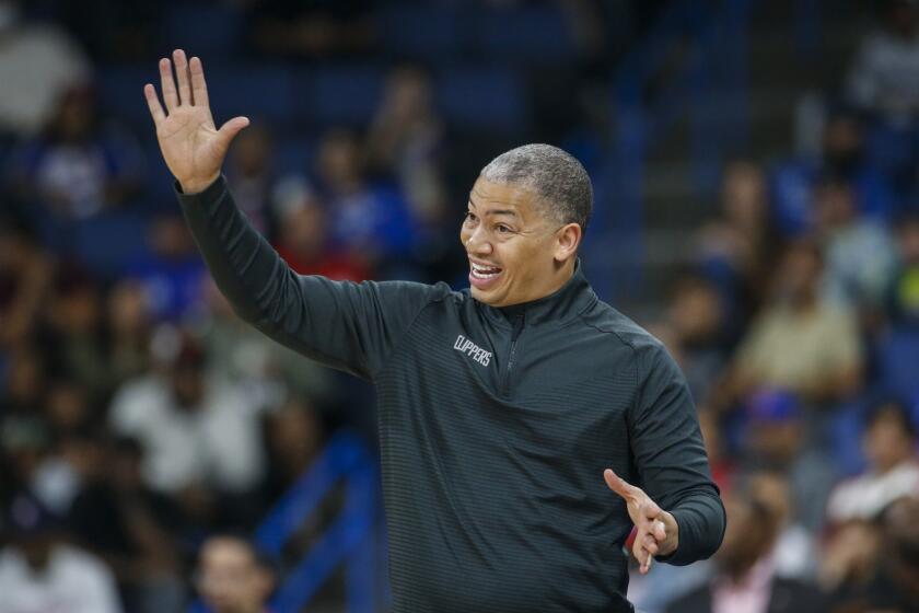 Los Angeles Clippers head coach Tyronn Lue gestures during the first half of an NBA preseason basketball game against the Denver Nuggets Wednesday, Oct. 12, 2022, in Ontario, Calif. (AP Photo/Ringo H.W. Chiu)