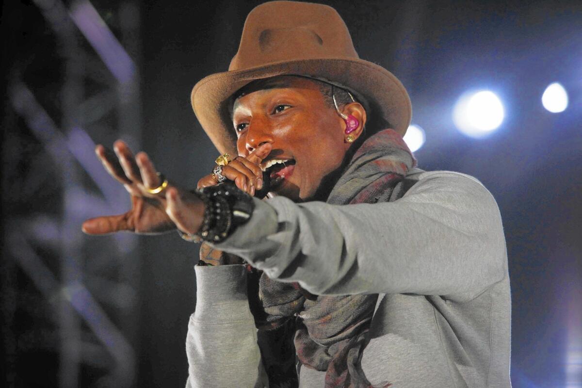 Pharrell Williams' successful and stylish 2014 included performing at the Coachella Valley Music and Arts Festival in Indio, Calif. -- sporting a smart hat, of course.