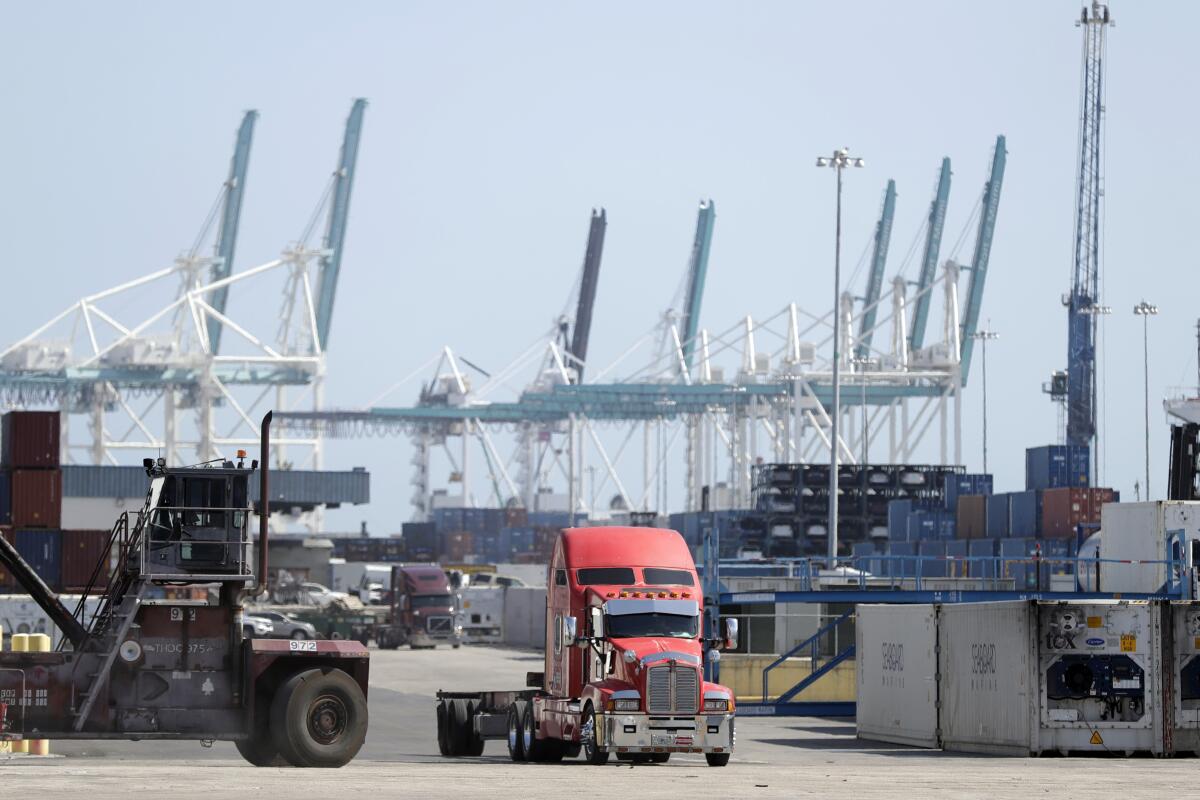 A truck leaves the docks at PortMiami