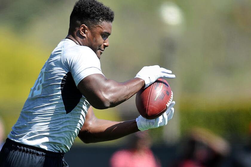 Myles Jack performs a drill for scout during UCLA's pro day last month.