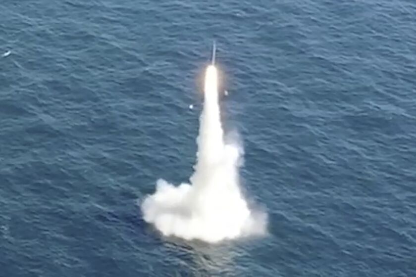In this image taken from video provided by the South Korea Defense Ministry, South Korea's first underwater-launched ballistic missile is test-fired from a 3,000-ton-class submarine at an undisclosed location in the waters of South Korea, Wednesday, Sept. 15, 2021. The rival Koreas test-launched ballistic missiles hours apart from each other on Wednesday in a display of military assets that came amid a faltering diplomatic push to strip North Korea of its nuclear program. South Korea's presidential office said it conducted its first underwater-launched ballistic missile test on Wednesday afternoon. It said a domestically built missile fired from a 3,000-ton-class submarine flew a previously set distance before hitting a designated target. (South Korea Defense Ministry via AP)
