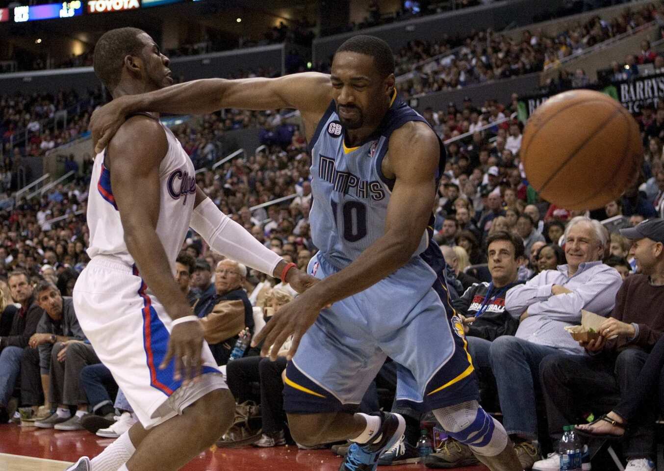 Clippers point guard Chris Paul forces Grizzlies guard Gilbert Arenas to lose the ball out of bounds in the second half Saturday afternoon at Staples Center.