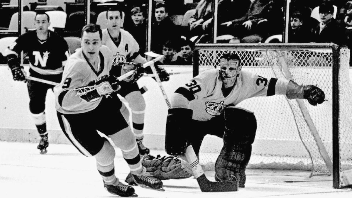 Kings goalie Terry Sawchuk moves to make a save during a 1967 game against the Minnesota North Stars at the Forum in Inglewood.