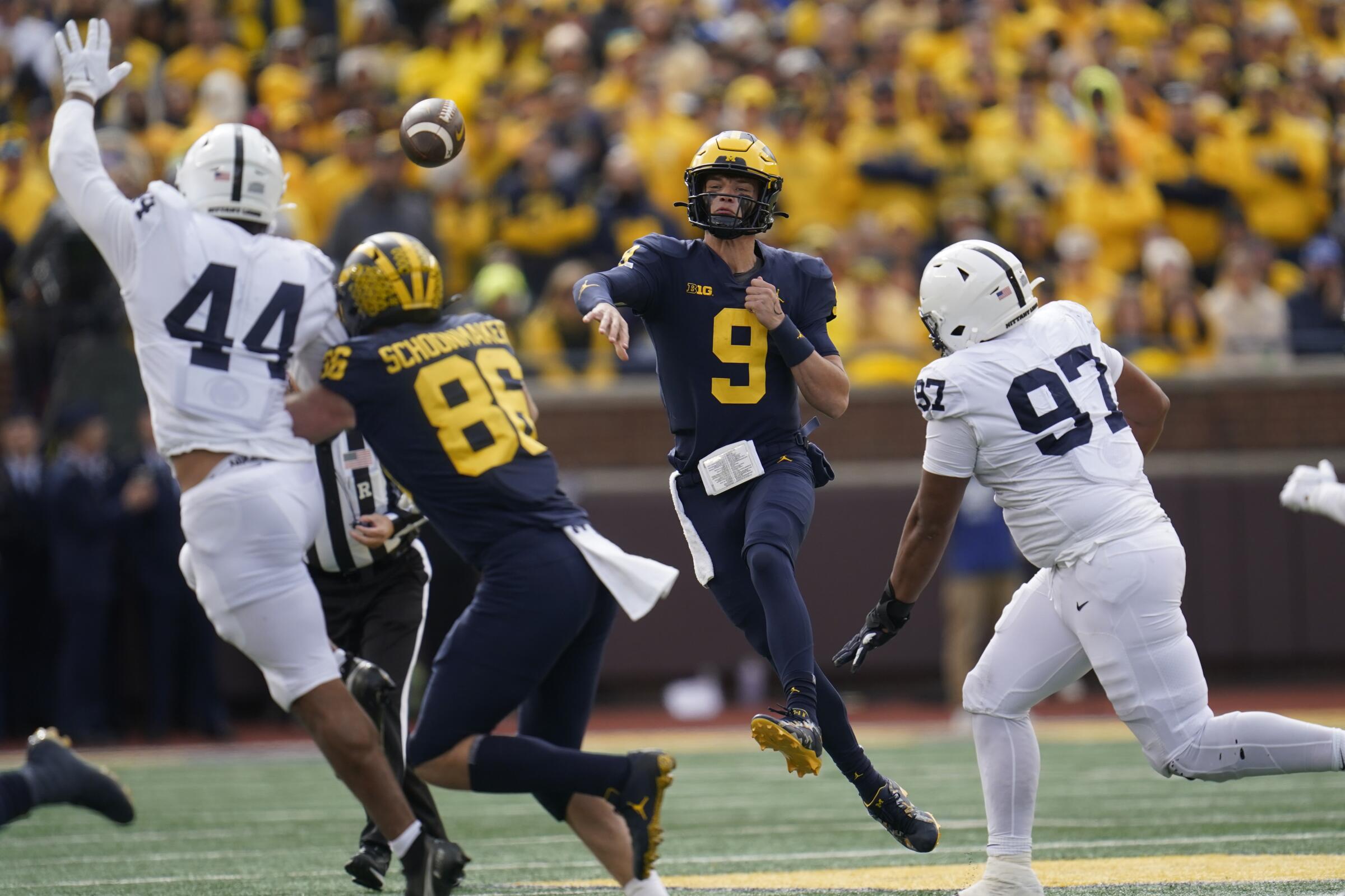 Michigan quarterback J.J. McCarthy (9) throws during a win over Penn State on Oct. 15.