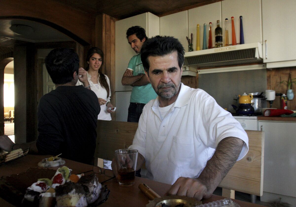 FILE - Iranian filmmaker Jafar Panahi is shown at his home after he was freed from jail on bail after more than two months in custody, in Tehran, Iran, on May 25, 2010 . Panahi who was arrested last summer, weeks before his latest film was released to widespread acclaim, has gone on hunger strike to protest his continued detention amid more than four months of anti-government protests. (AP Photo, File)