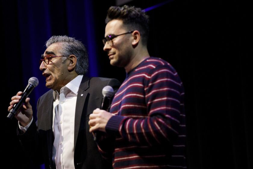 Actors Eugene Levy and Dan Levy speak during Schitt's Creek Live at the theatre at the Ace Hotel on Sunday, September 23, 2018 in Los Angeles, Calif. (Patrick T. Fallon/ For The Los Angeles Times)