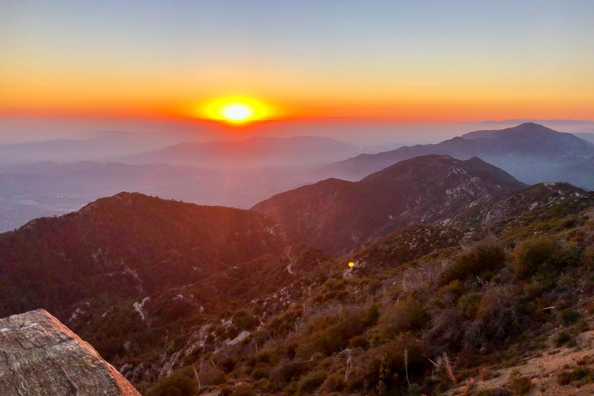 The sunset view from nearby Mount Lowe, which campers can reach by hiking from the trailhead campground.