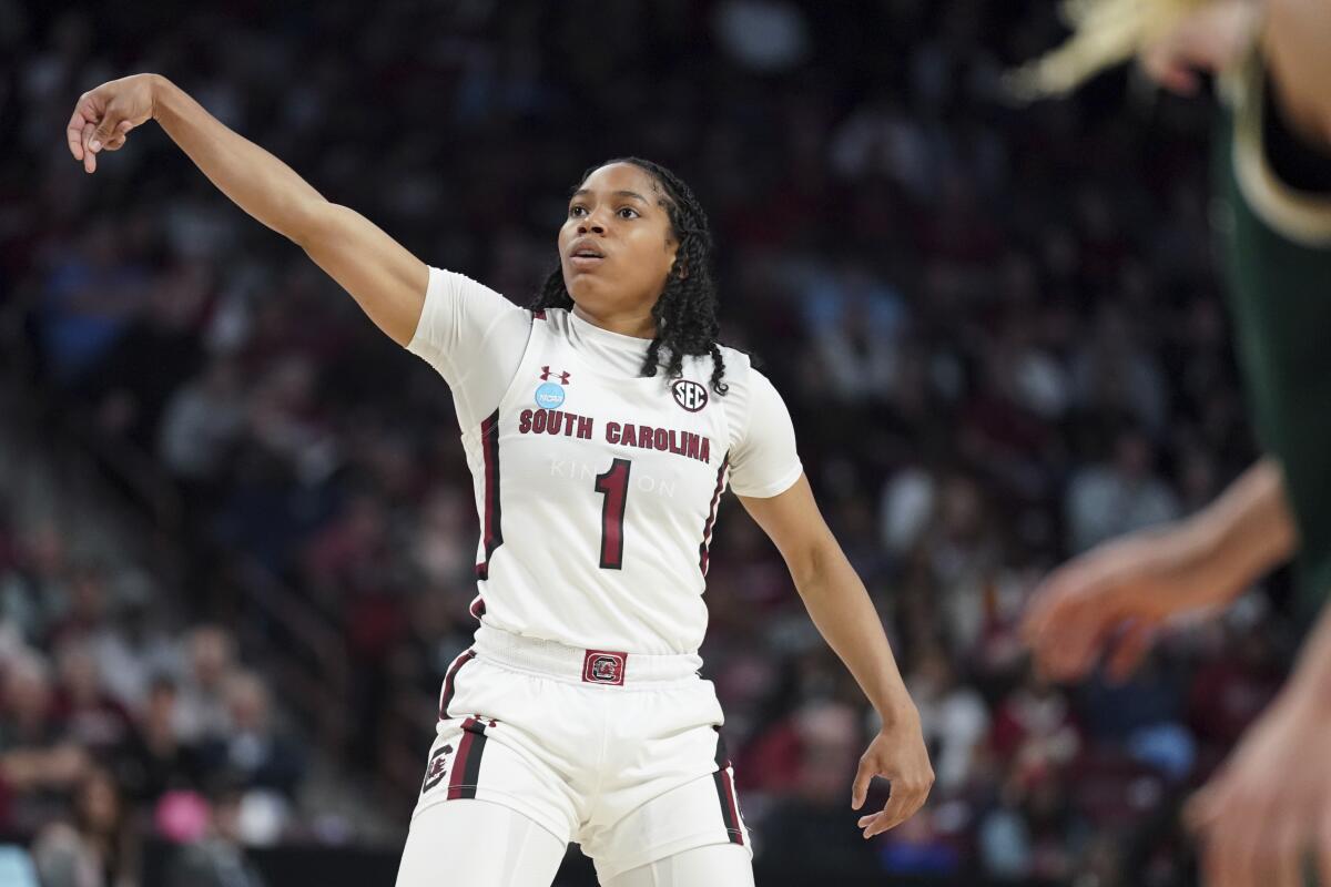 South Carolina guard Zia Cooke follows through on a three-point basket in the first half against South Florida.