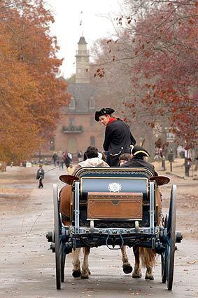 In Virginia's Colonial Williamsburg, a horse-drawn carriage tour explores the 18th-century town's mile-long district. It bills itself as America's largest living outdoor museum, with 500 buildings.