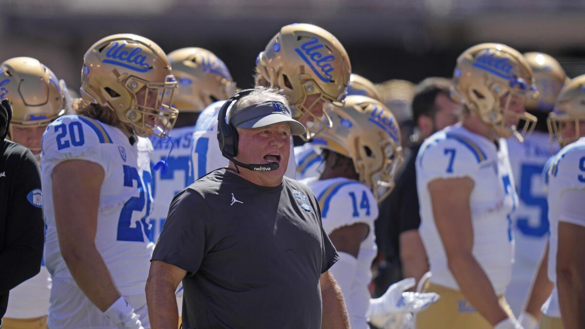 UCLA coach Chip Kelly looks on from the sidelines during the first half against Utah.