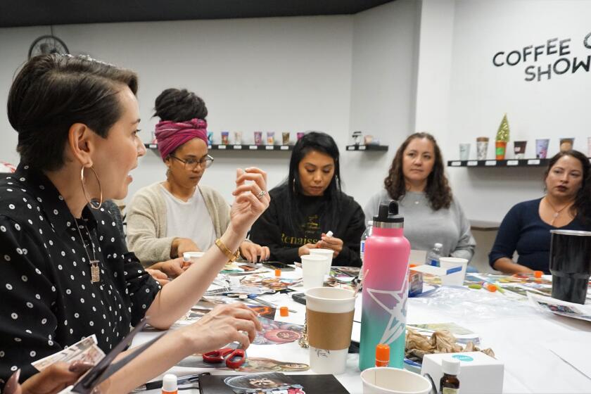 Art therapist Berenice Badillo leads a discussion on trauma and self care on Friday, Dec. 13, at Project Reo Collective in Paradise Hills. The coffee shop will hold free monthly therapeutic events for community members.
