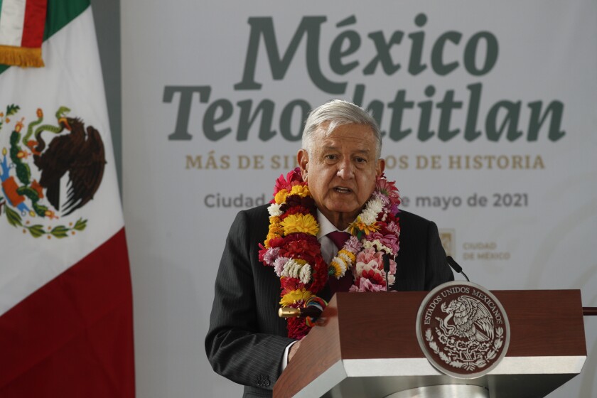 Mexican President Andres Manuel Lopez Obrador talks during a ceremony marking the 700 year anniversary of the founding of Tenochtitlan, known as Mexico City at the Templo Mayor archeological site in Mexico City, Thursday, May 13, 2021. (AP Photo/Eduardo Verdugo)