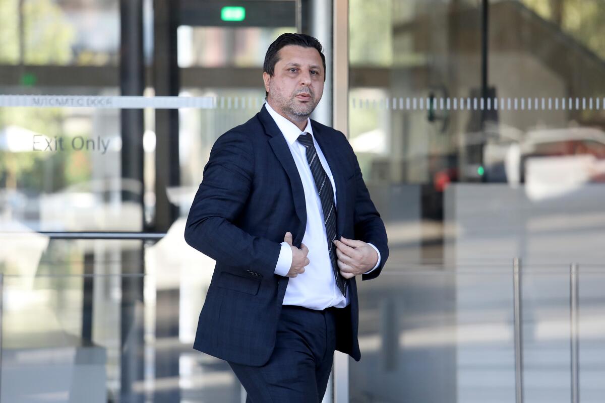 Richard Ayvazyan of Tarzana exits a federal courthouse in downtown Los Angeles.