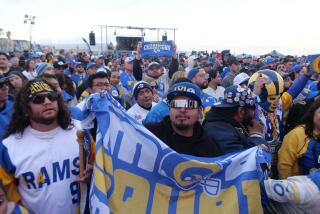 HERMOSA BEACH, CALIFORNIA - APRIL 25: Fans attend the Los Angeles Rams Draft Experience presented by SoFi on April 25, 2024 in Hermosa Beach, California. (Photo by Kaelin Mendez/Getty Images)