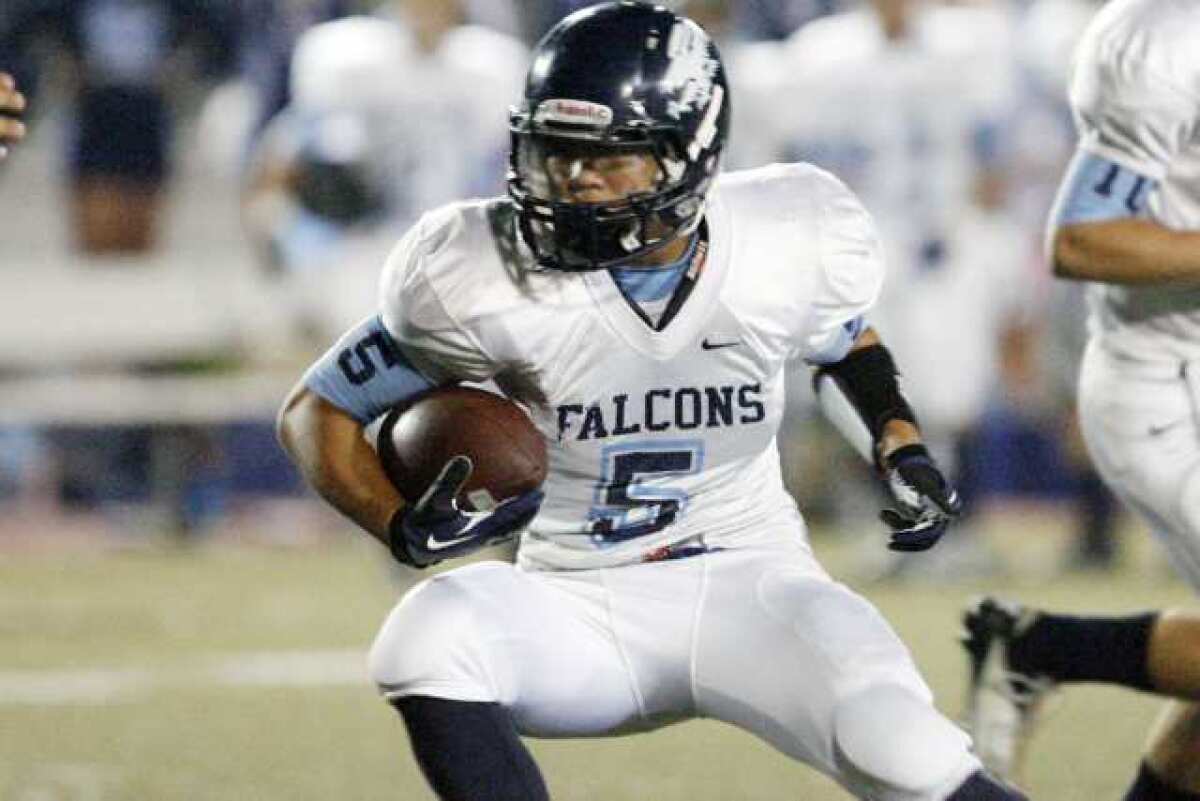 ARCHIVE PHOTO: Crescenta Valley's running back William Wang cuts back a run against Glendale.