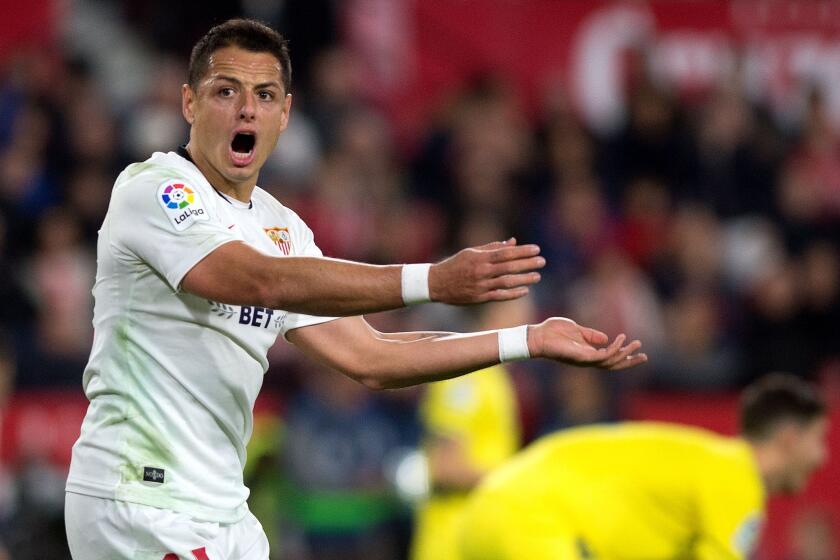 Sevilla's Mexican forward Chicharito reacts during the Spanish league football match between Sevilla FC and Villarreal CF at the Ramon Sanchez Pizjuan stadium in Seville on December 15, 2019. (Photo by JORGE GUERRERO / AFP) (Photo by JORGE GUERRERO/AFP via Getty Images)