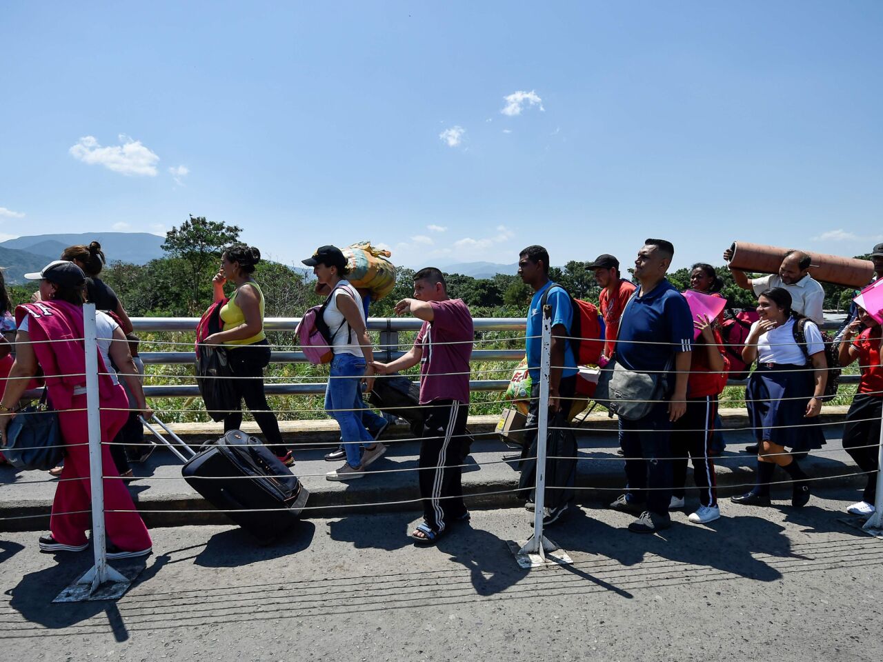 People cross the Simon Bolivar International bridge from Cucuta in Colombia to San Antonio de Tachira in Venezuela.