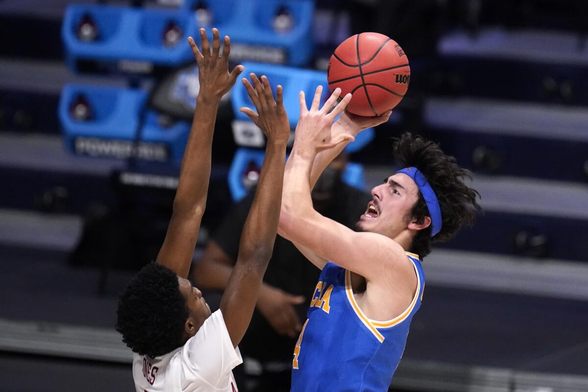 UCLA guard Jaime Jaquez Jr. shoots over Alabama forward Herbert Jones.