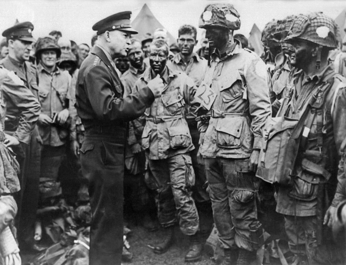 Supreme Allied Commander Gen. Dwight D. Eisenhower gives the order of the day to U.S. paratroopers before they board their airplane for the first assault in the invasion of Normandy on D-Day.