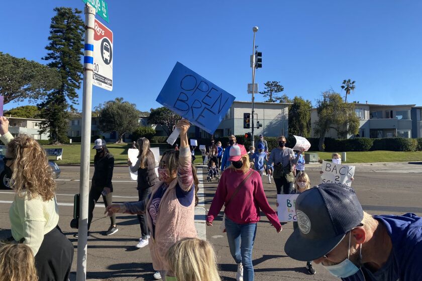 Parents and students from the five La Jolla cluster schools protested ongoing school closures Feb. 18.