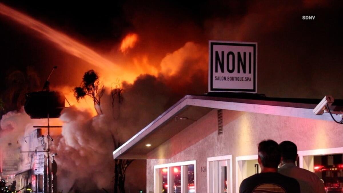 Firefighters extinguished a two-alarm fire at Mozy Cafe in Encinitas early Monday morning.