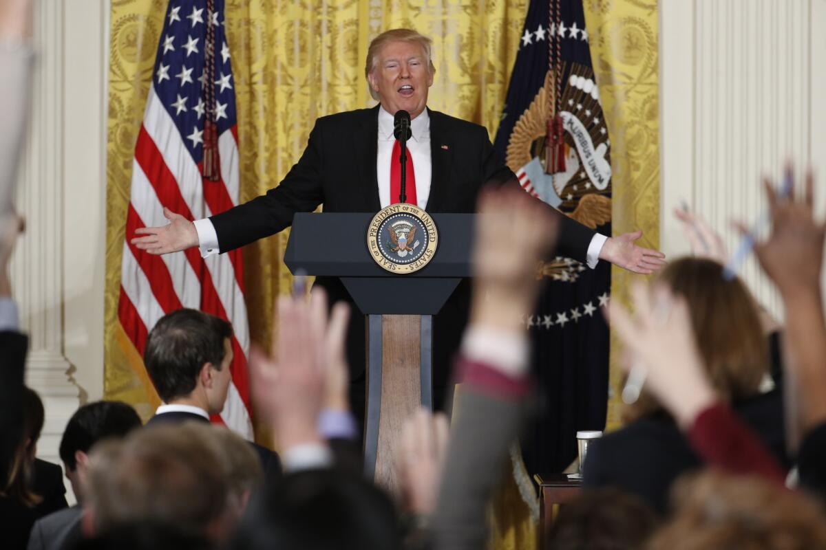 President Trump boasts about his election victory and attacks journalists at a news conference in February. (Pablo Martinez Monsivais / Associated Press)