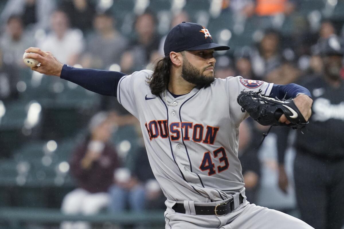 Houston Astros starting pitcher Lance McCullers Jr. throws to a Chicago White Sox batter during the first inning of a baseball game in Chicago, Friday, July 16, 2021. (AP Photo/Nam Y. Huh)