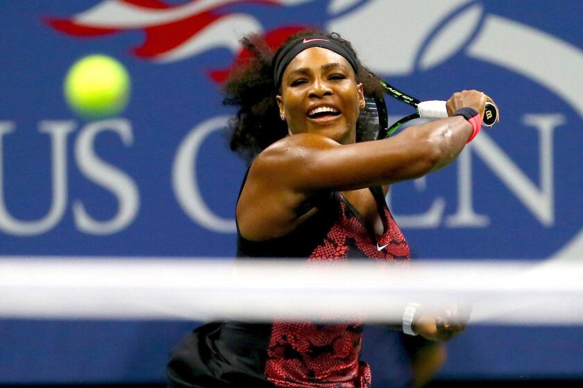 Serena Williams returns a shot against Bethanie Mattek-Sands during their third-round match at the U.S. Open on Friday in New York.