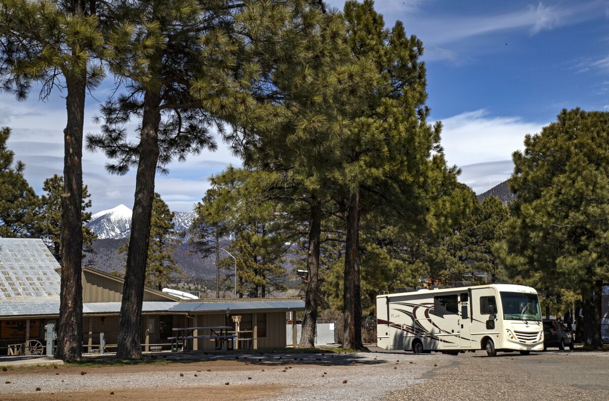 An RV pulls into Black Bart's RV Park in Flagstaff, Ariz., during the pandemic. 